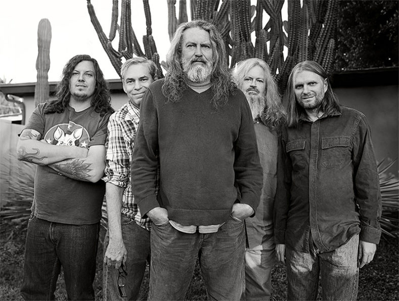 SPILL FEATURE: IT’S HARD NOT TO FEEL LIKE AN ANACHRONISM THESE DAYS – A CONVERSATION WITH MEAT PUPPETS DRUMMER DERRICK BOSTROM Meat Puppets