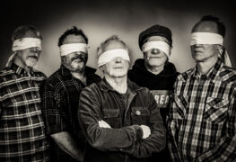 SPILL FEATURE: TO BE OR NOT TO BE: FROM POPULAR FRONT TO LOW TIMES APLENTY – A CONVERSATION WITH RON HAWKINS OF LOWEST OF THE LOW Lowest Of The Low